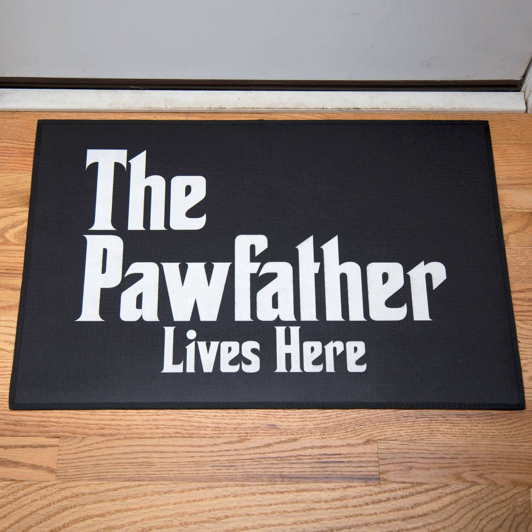 Black rectangular door mat with &