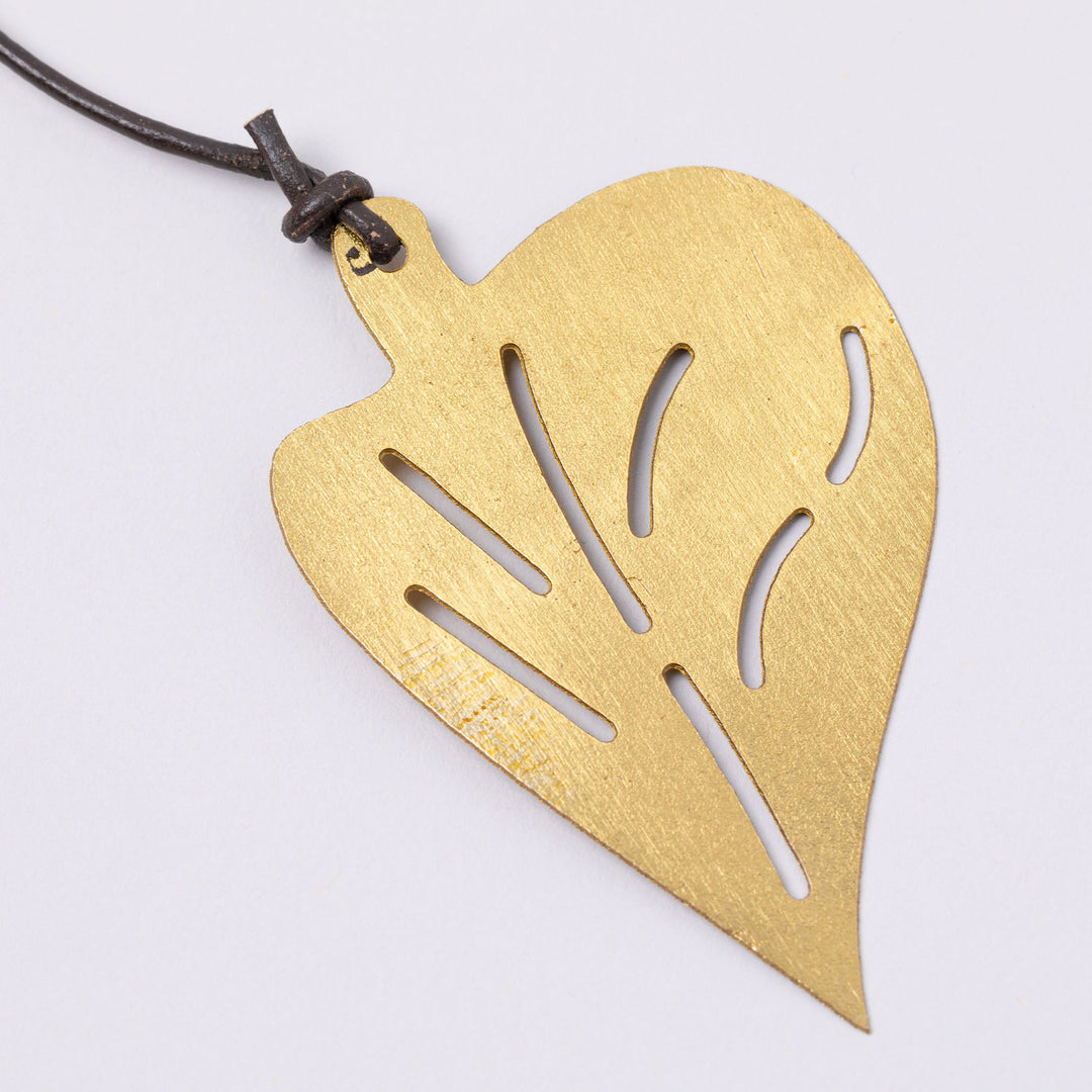 Gold-tone heart-shaped bird iron wind chime charm with cutout feather lines
