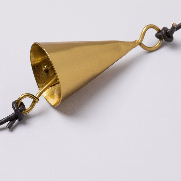 Gold iron wind chime bell with hanging loop and black cord