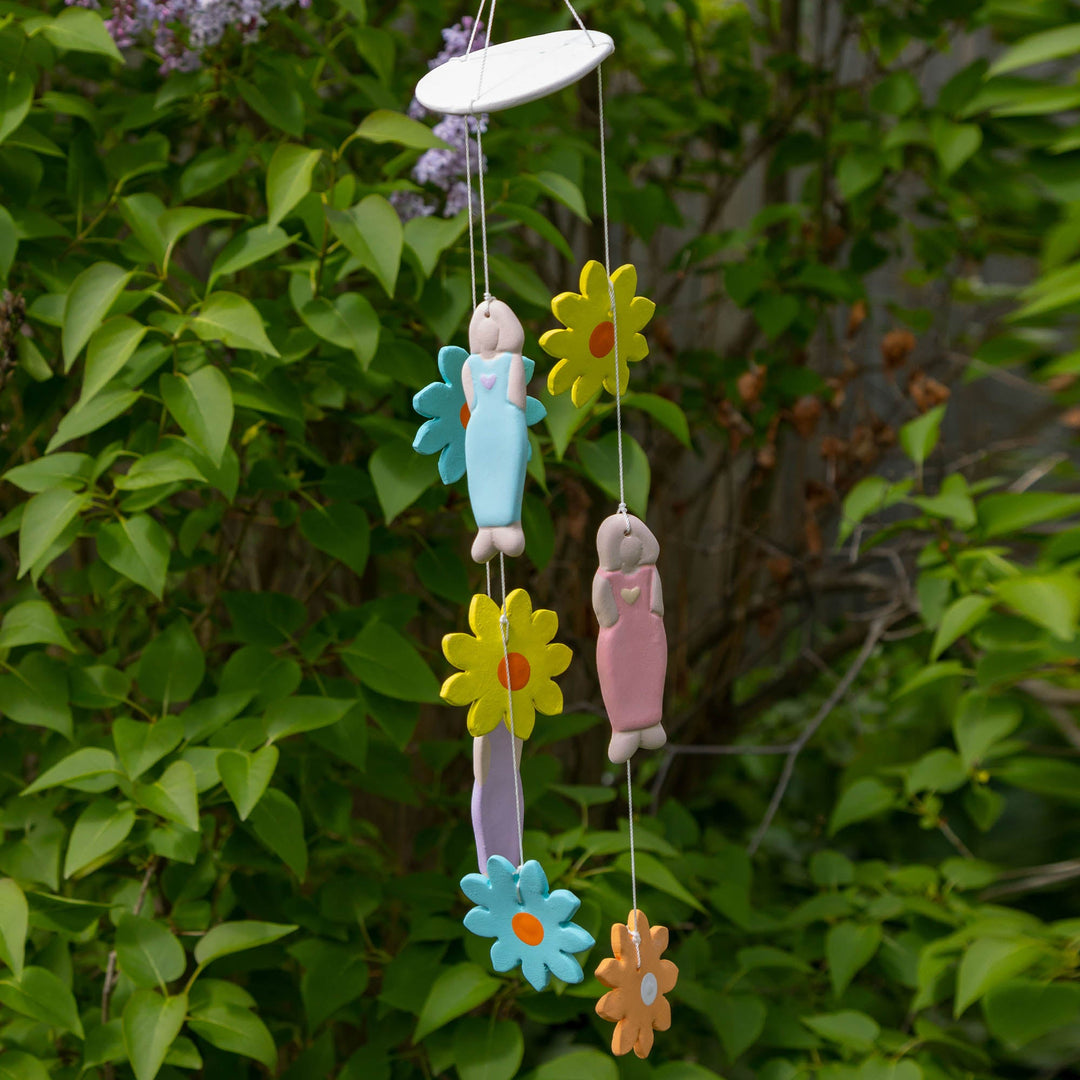 Ceramic flower chime with pastel dancer charms and hanging yellow, blue, pink flowers