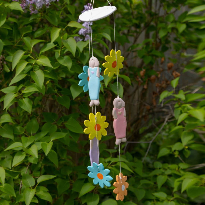 Ceramic flower chime with pastel dancer charms and hanging yellow, blue, pink flowers