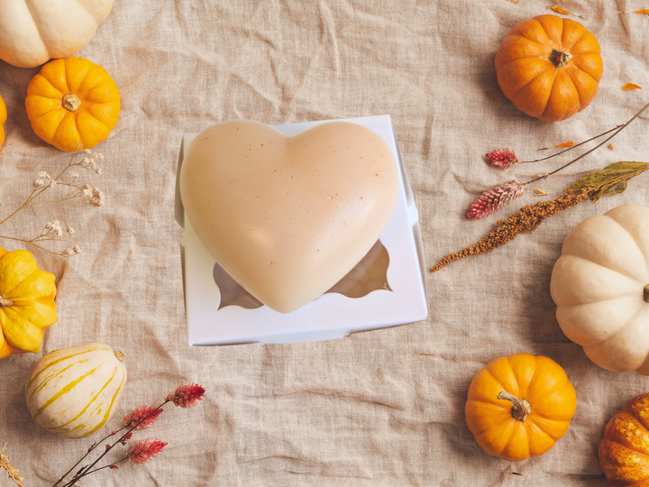 Cream heart-shaped wax sachet in a white box with a message cutout