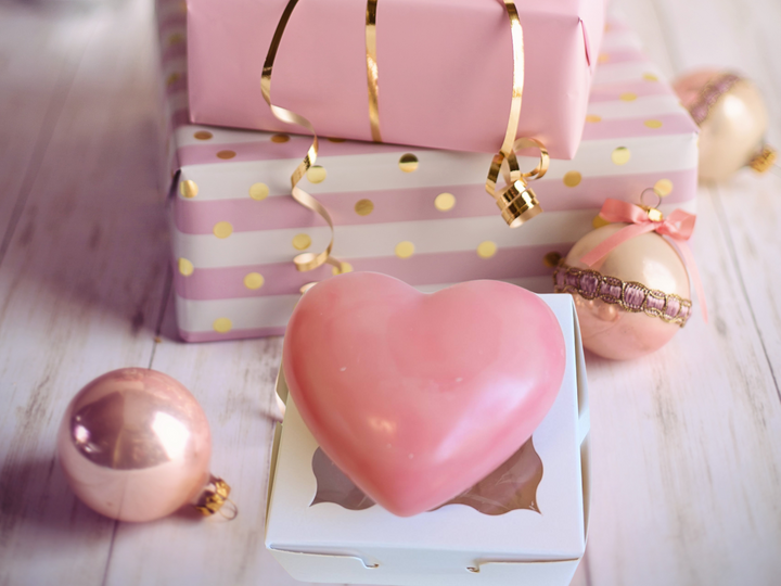 Pink heart wax freshener in white gift box with heart-shaped cutout