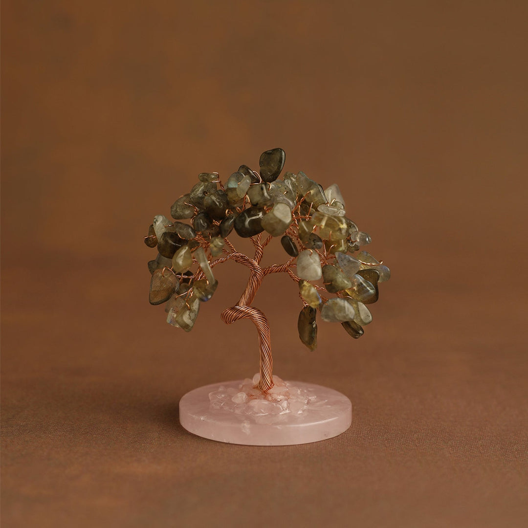 Mini crystal tree with smoky green-gray gemstones on pink stone base