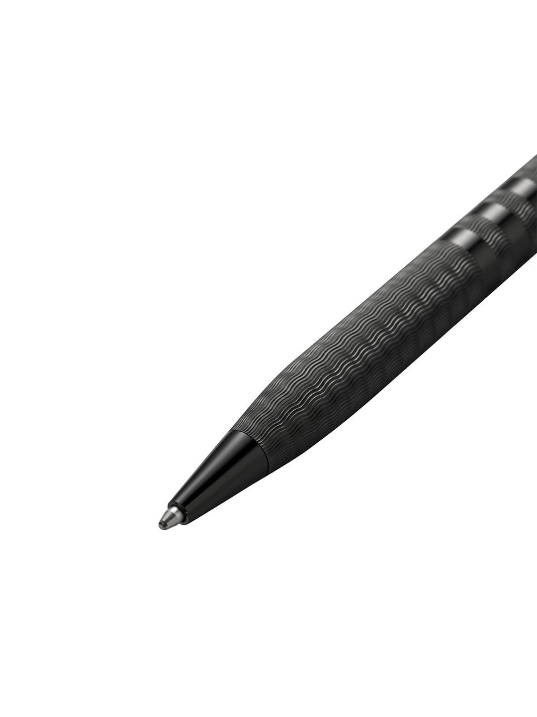 Black ballpoint pen tip close-up with textured barrel grip