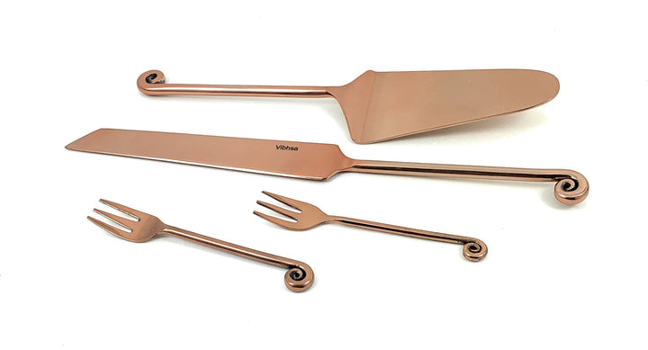 Copper-finish cake cutting set with cake knife, server spatula, and two matching forks