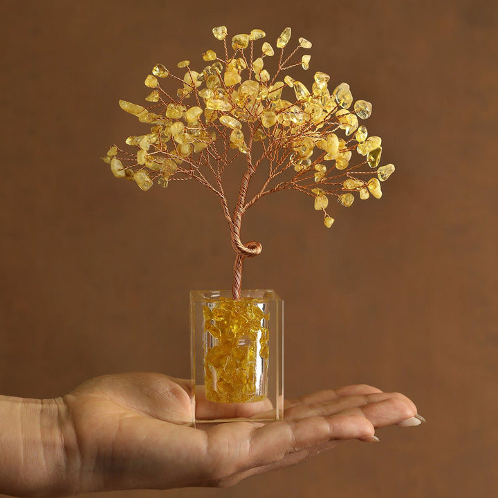 Yellow crystal tree ornament with wire branches and citrine-style chips in a clear cube base