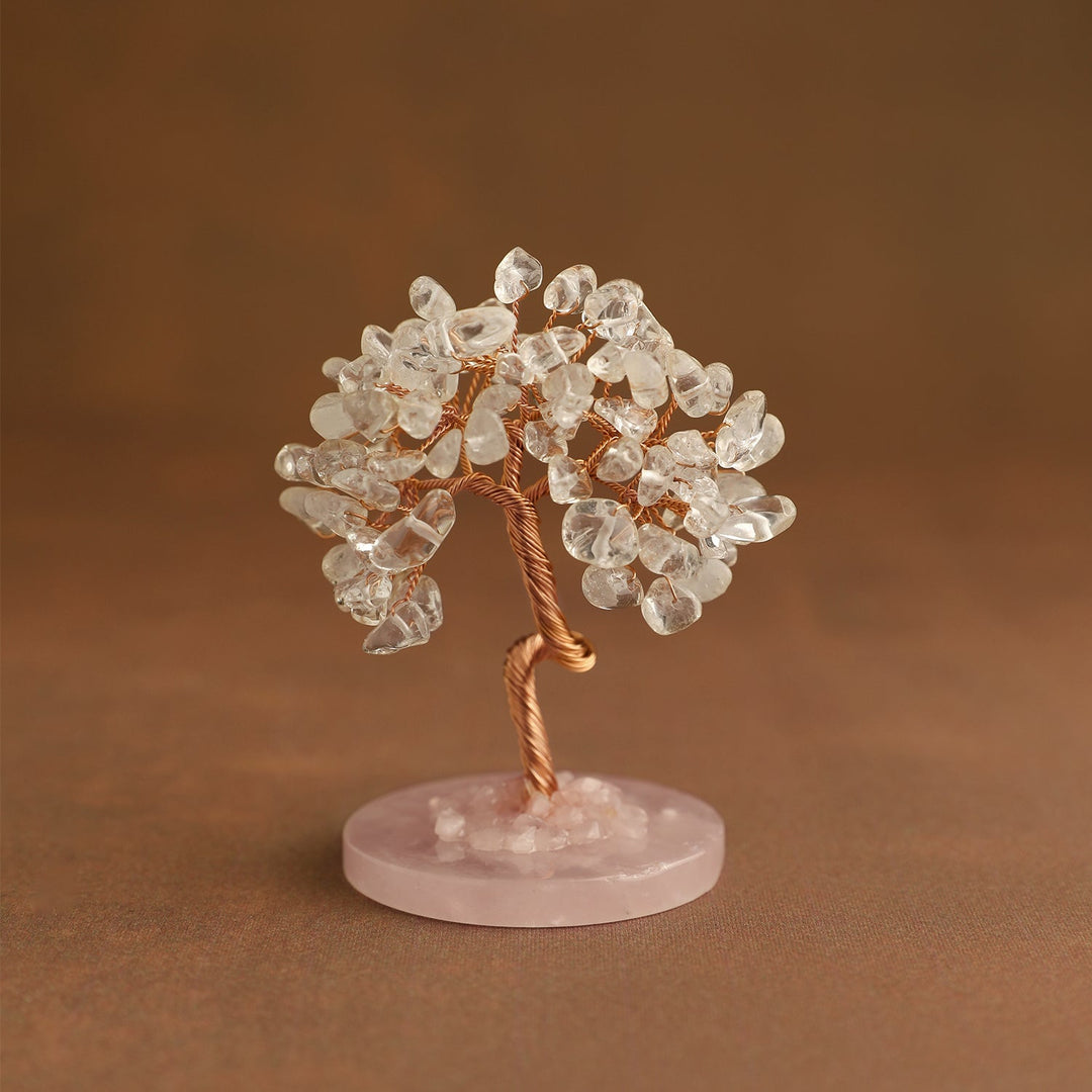 Crystal tree ornament with clear gemstone chips on pink round base