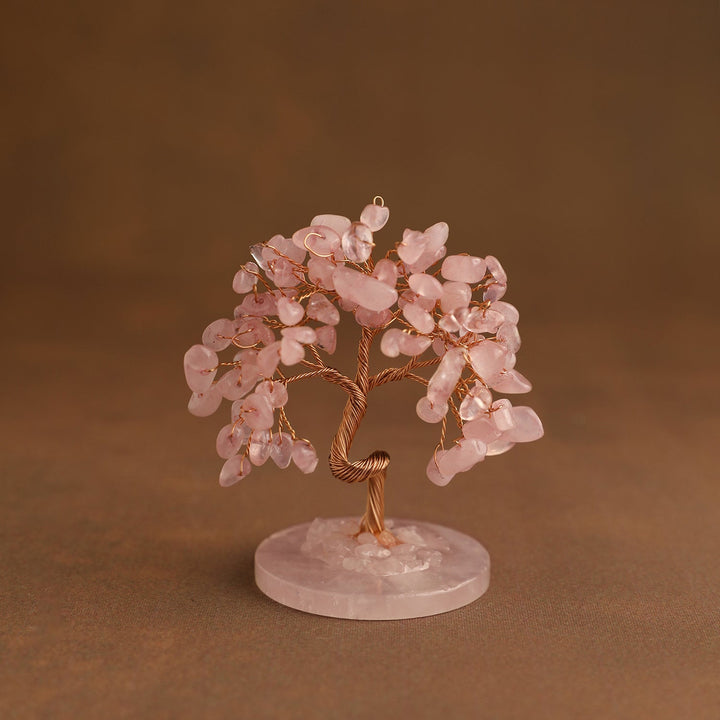 Pink gemstone crystal tree with wire branches on round rose quartz base