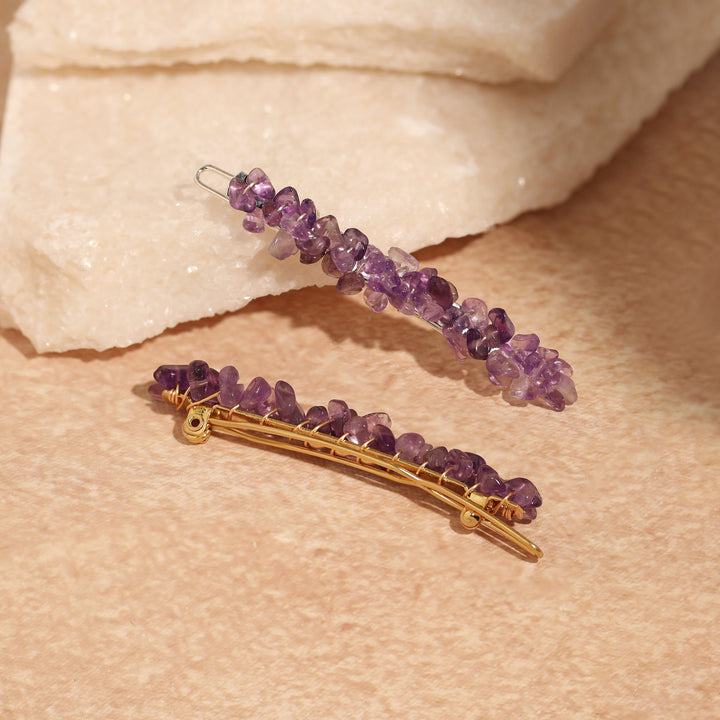 Two amethyst purple beaded hair clips, one gold-tone and one silver-tone