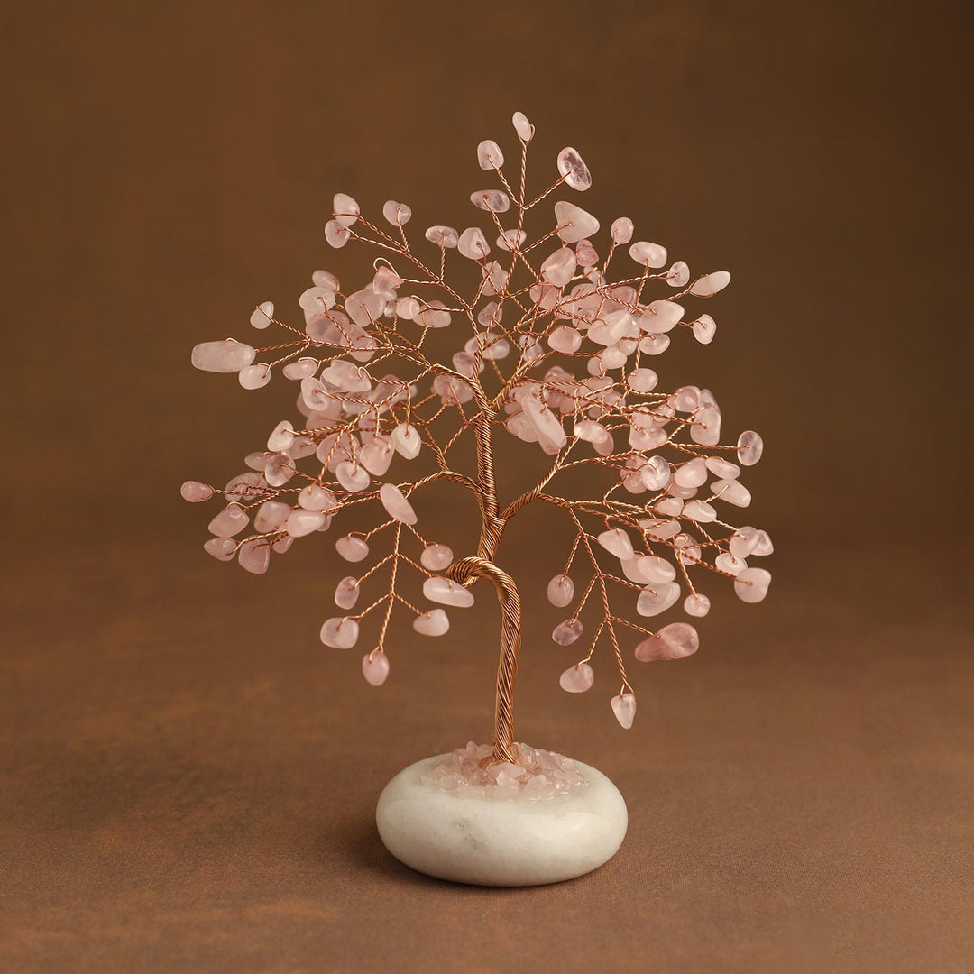 Pink crystal tree ornament with wire branches, pink beads, and white stone base