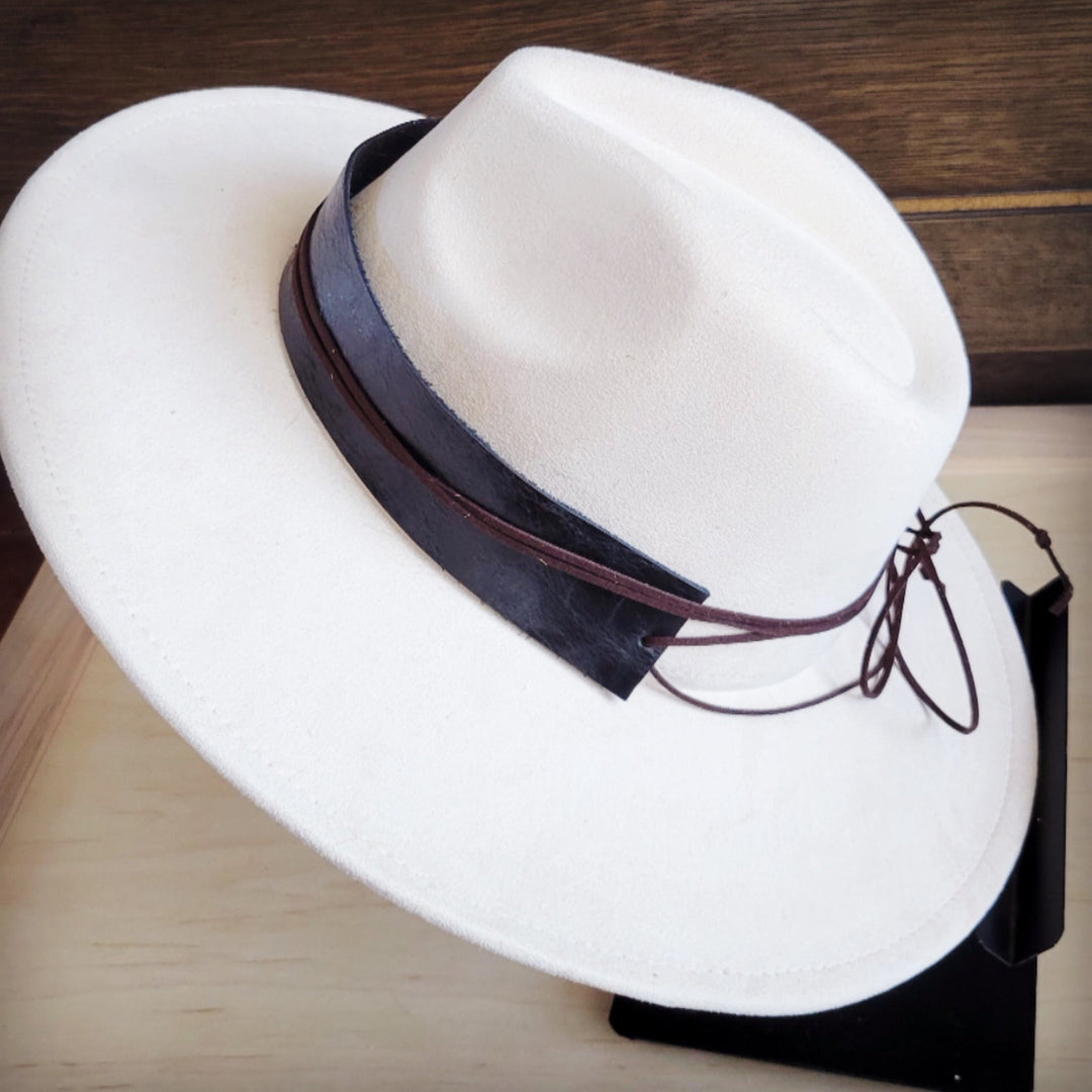 Wide black genuine leather hat band with attached dark cord ties