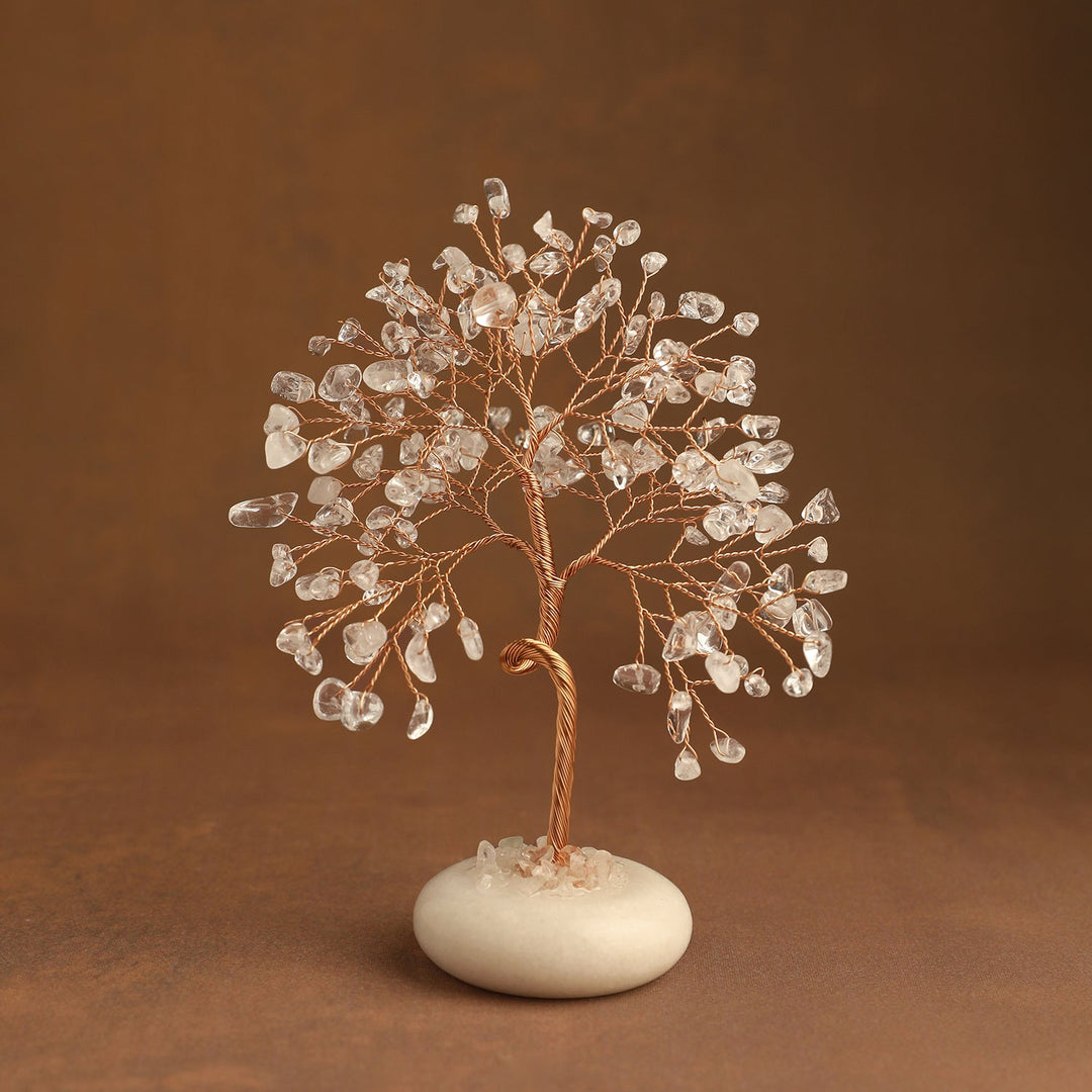Clear crystal tree with faceted gem leaves and a white jade stone base