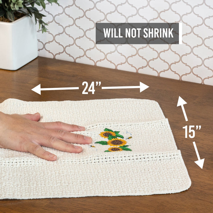Off-white cotton kitchen towel with yellow sunflower embroidery