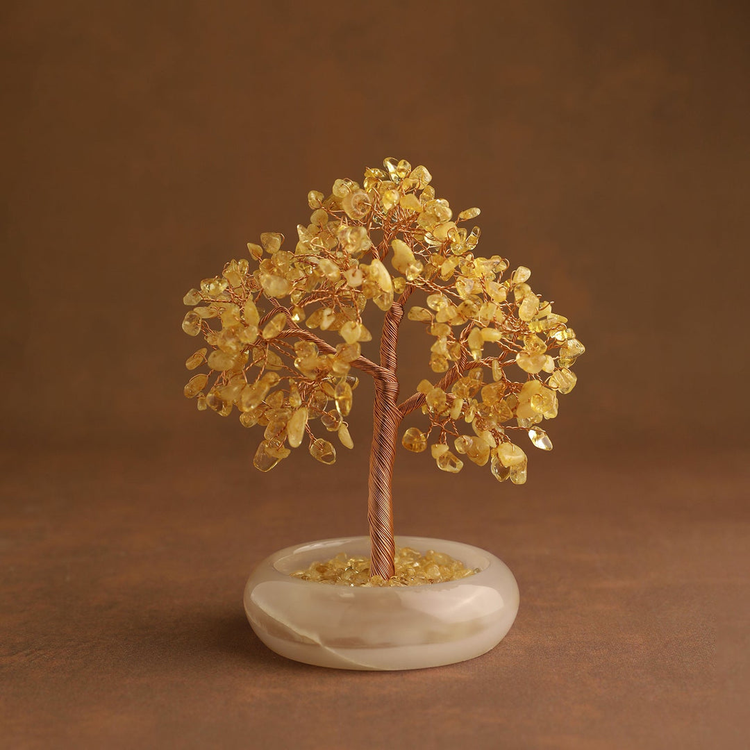 Gold crystal tree ornament with wire trunk and round white stone base