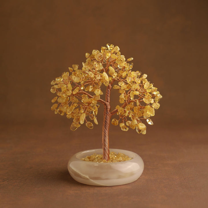 Gold crystal tree ornament with wire trunk and round white stone base