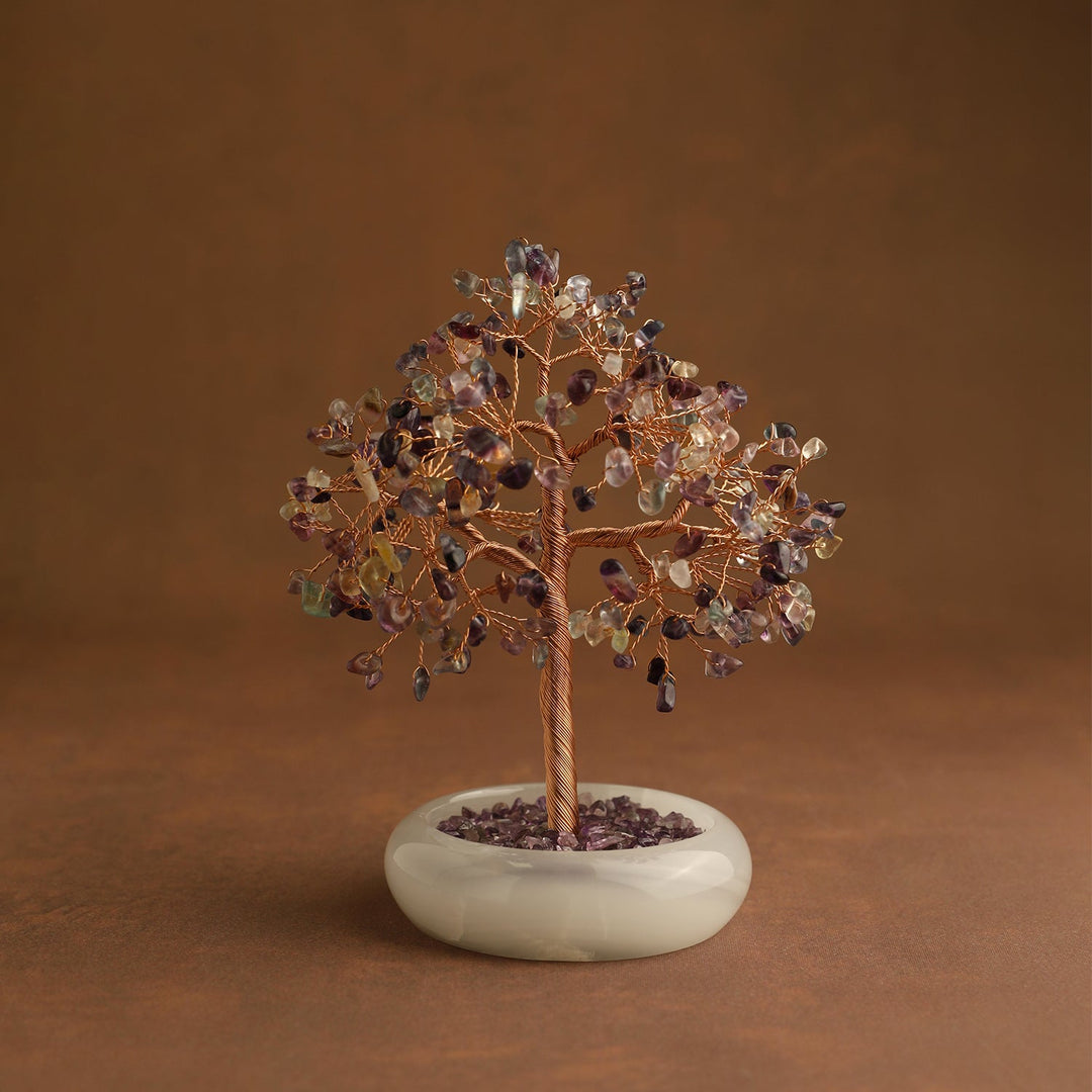 Purple and amber crystal tree ornament with wire trunk and round white base