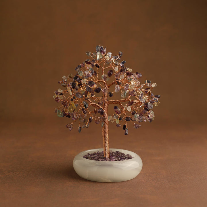 Purple and amber crystal tree ornament with wire trunk and round white base