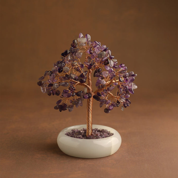 Amethyst crystal tree with gold-toned wire trunk and round white base