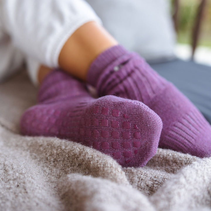Viola merino wool socks with textured non-slip dots on foot sole