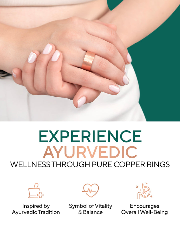 Two copper hammered rings on hands, wide open-cuff bands
