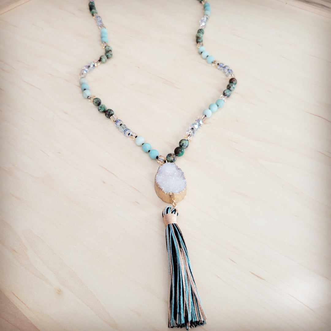 Long beaded necklace with white druzy teardrop pendant and hanging tassel