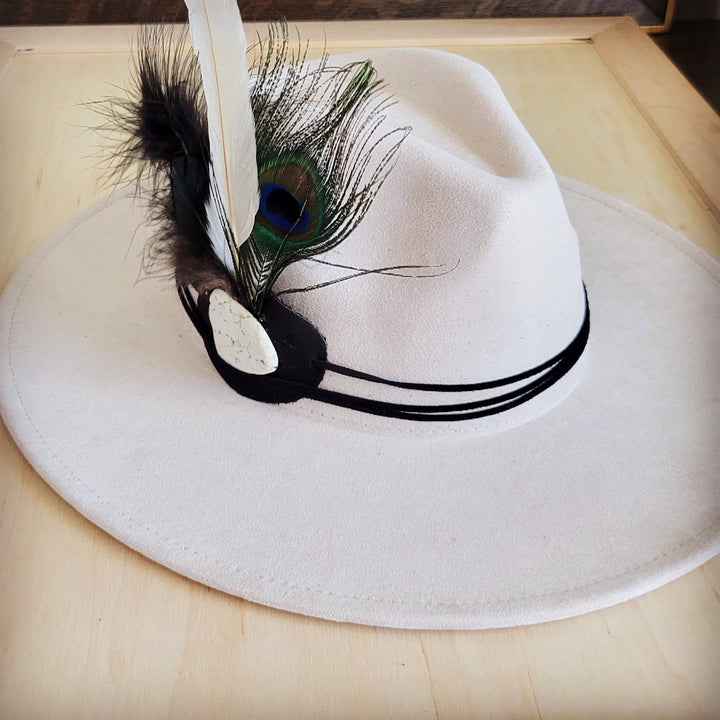 Peacock feather leather hat band with turquoise peacock eye and black striped edging