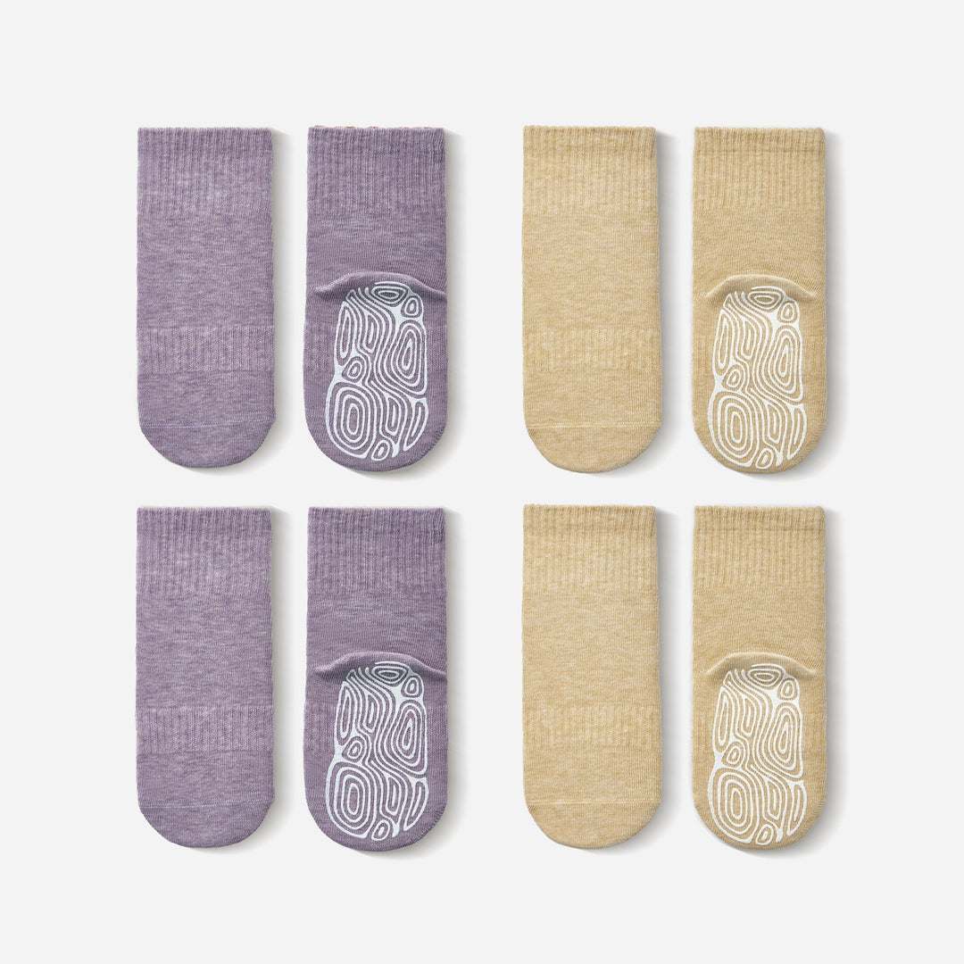 Baby non-slip socks set of four, lavender, lemon yellow, and tan with swirl grips