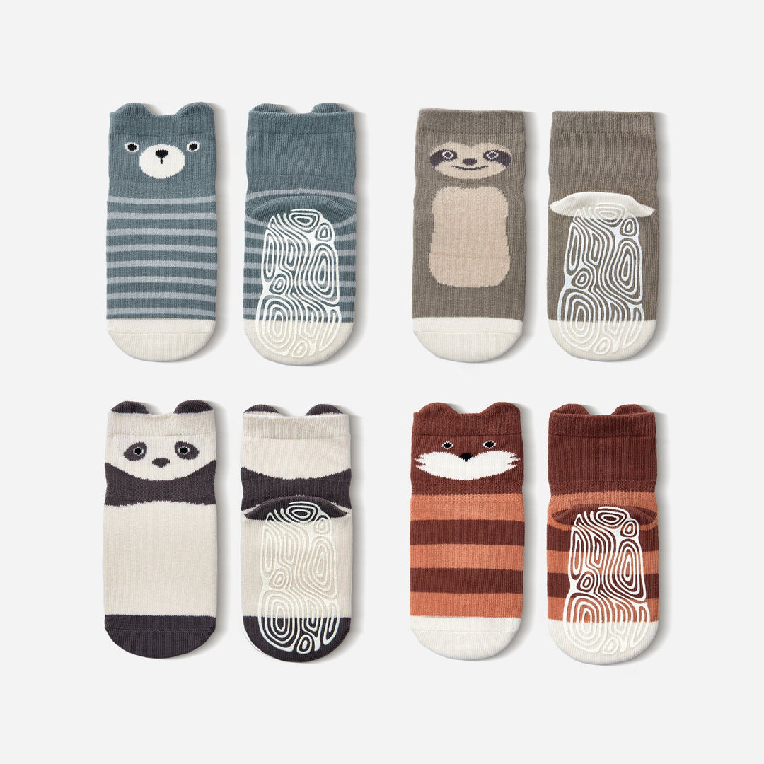 Set of baby non-slip crew socks with bear, panda, stripe, and swirl designs