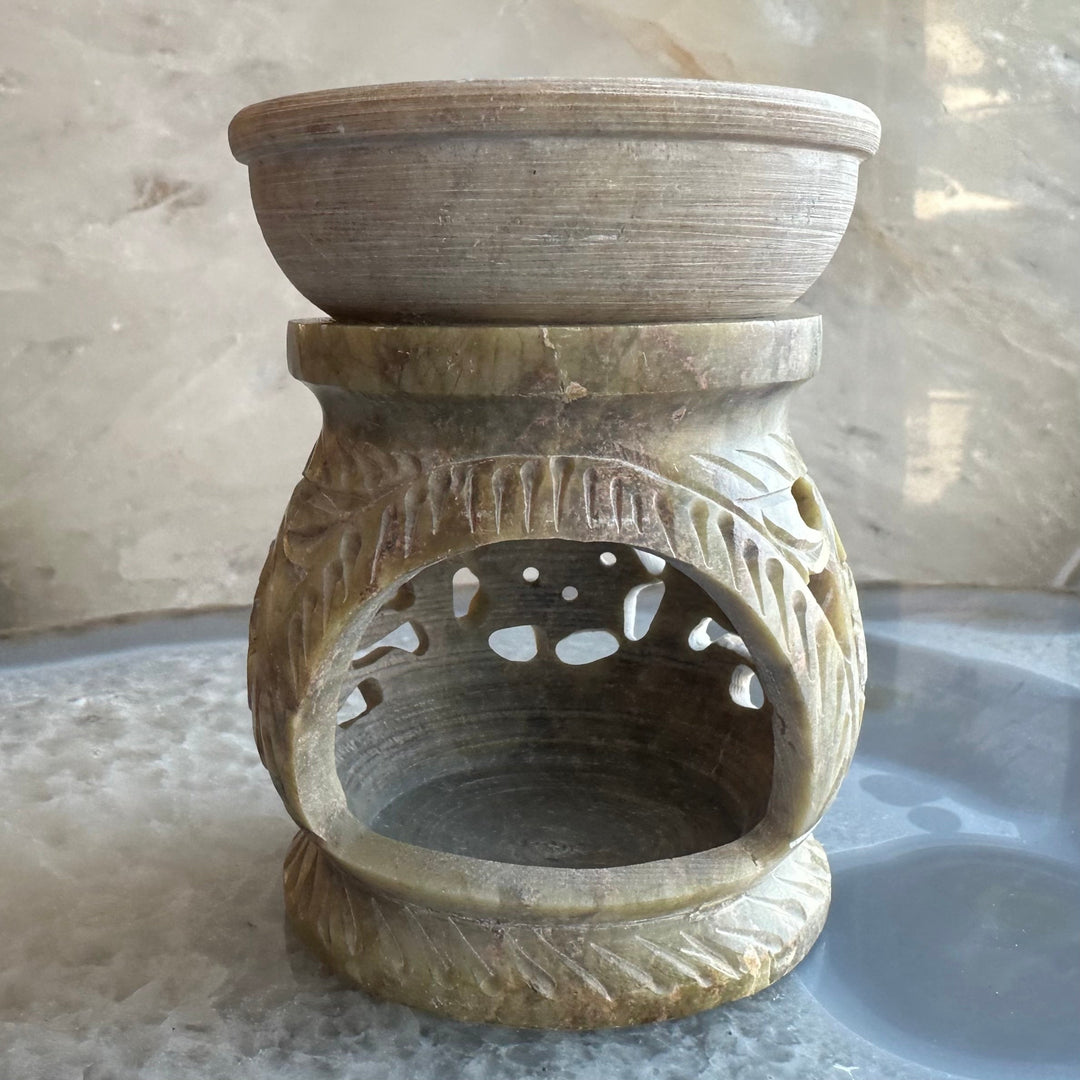 Carved soapstone essential oil burner with round vent and dot motif