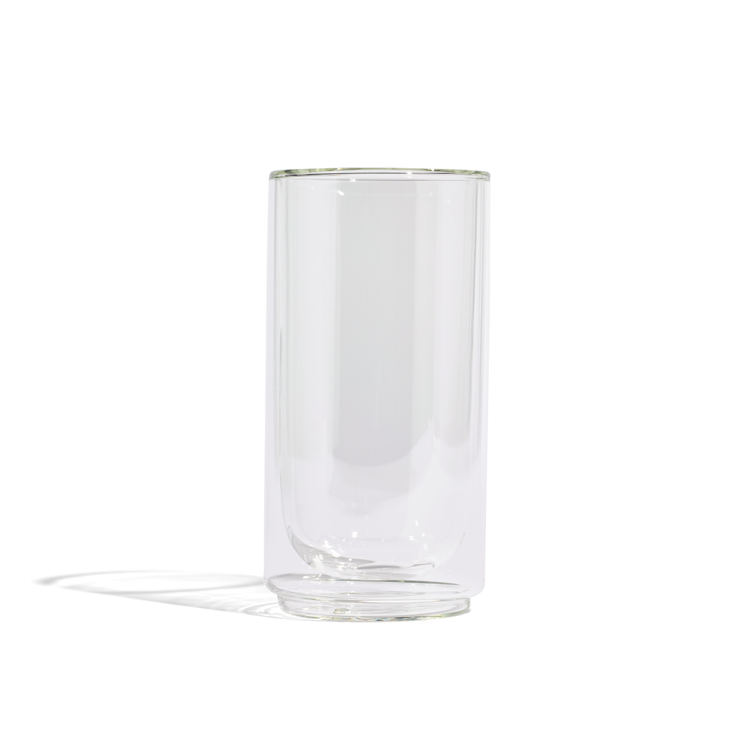 Clear glass pint tumbler with thick base and smooth rim