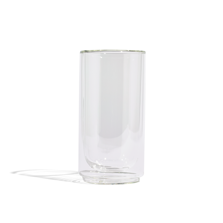 Clear glass pint tumbler with thick base and smooth rim