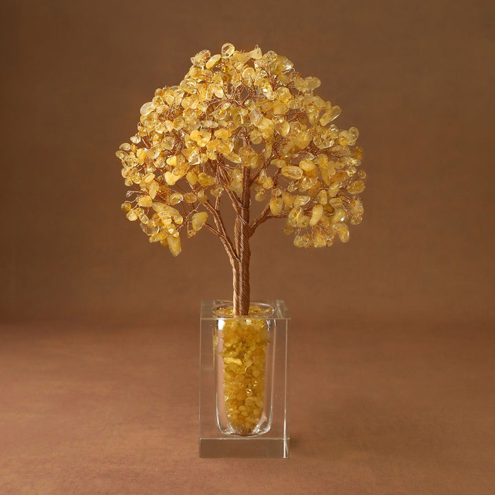 Golden crystal tree ornament with textured branches in a clear acrylic display box