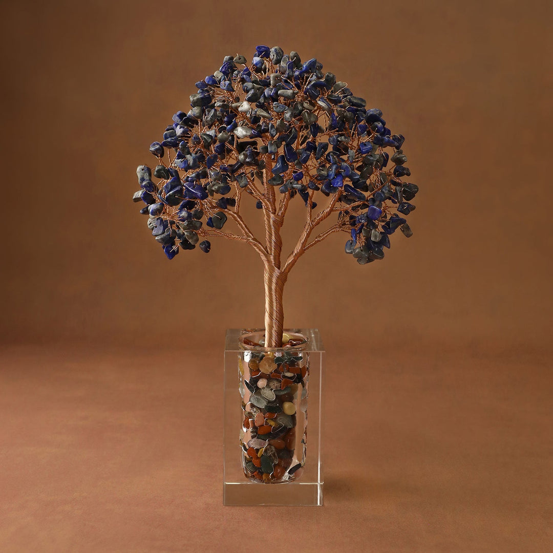 Blue crystal tree ornament with faceted branches in a clear acrylic display box