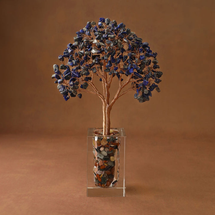 Blue crystal tree ornament with faceted branches in a clear acrylic display box
