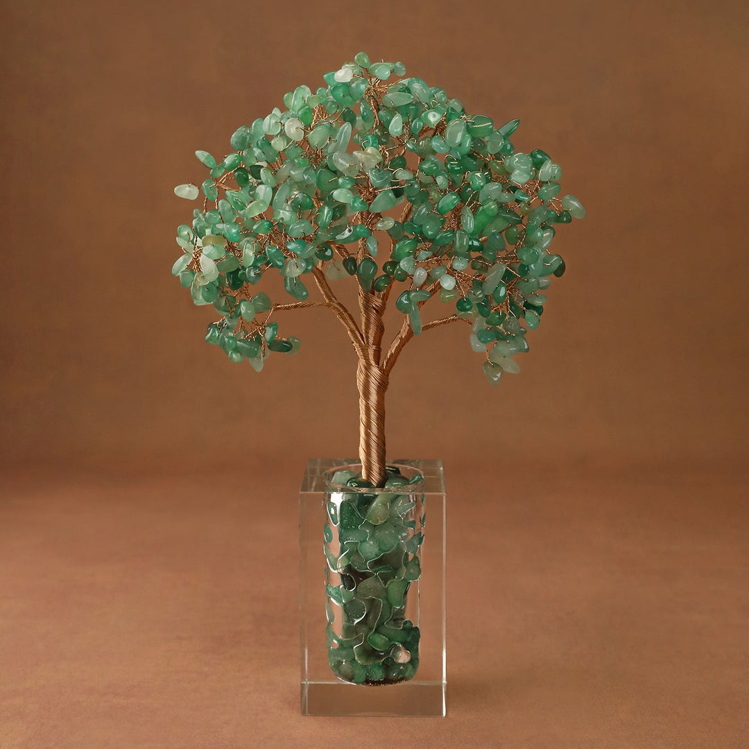 Green crystal tree ornament with bead-like branches in a clear acrylic display box