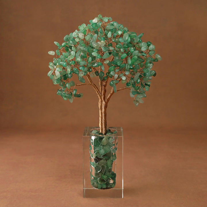 Green crystal tree ornament with bead-like branches in a clear acrylic display box