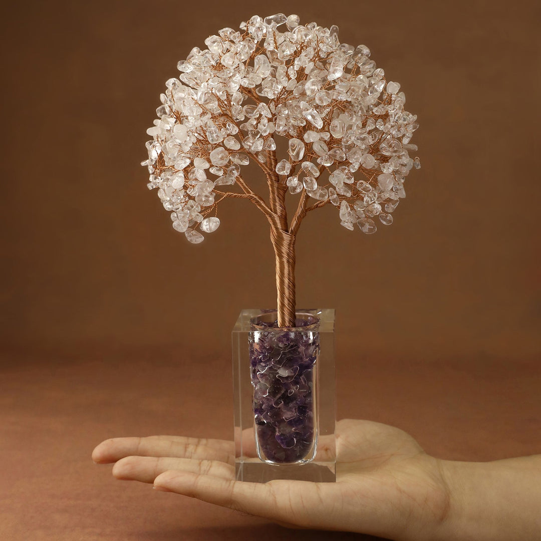 White crystal tree with faceted stone branches and a clear cube base