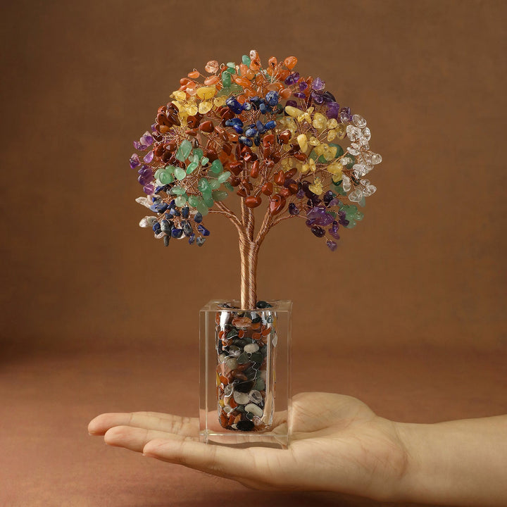 Multicolor crystal tree ornament with bead branches in a clear cube base, in palm