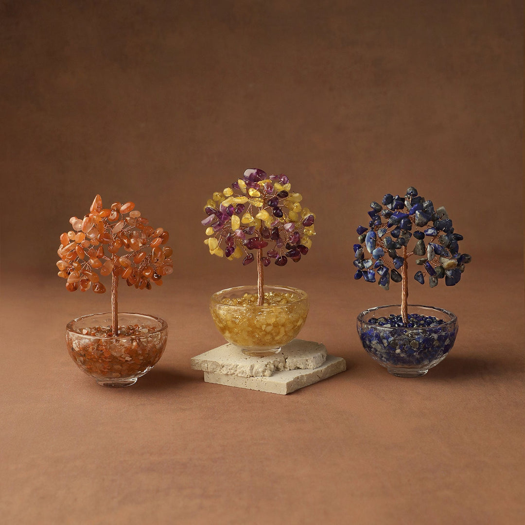 Crystal gemstone tree trio with orange, purple, and blue beaded canopies in resin pots