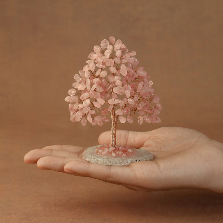Pink crystal tree sculpture with wire trunk and teardrop gem canopy on round base