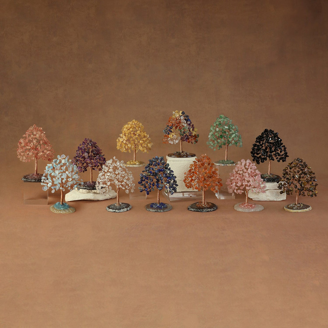 Multicolor crystal bead tree with leafy branches on a stone base
