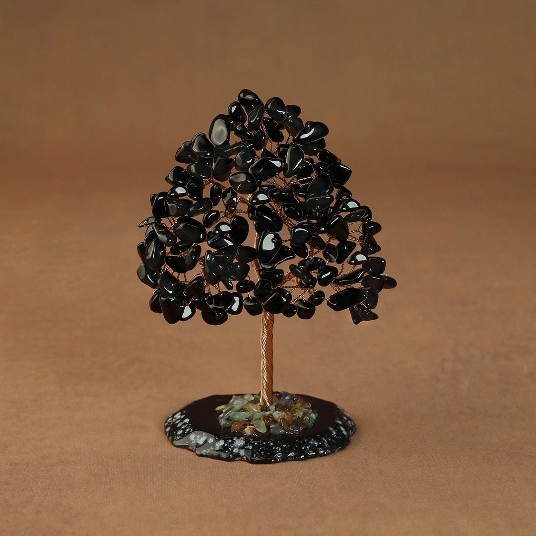 Black crystal tree sculpture with wire trunk and black gem chip canopy on base