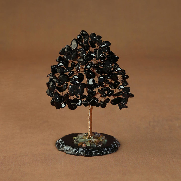 Black crystal tree sculpture with wire trunk and black gem chip canopy on base