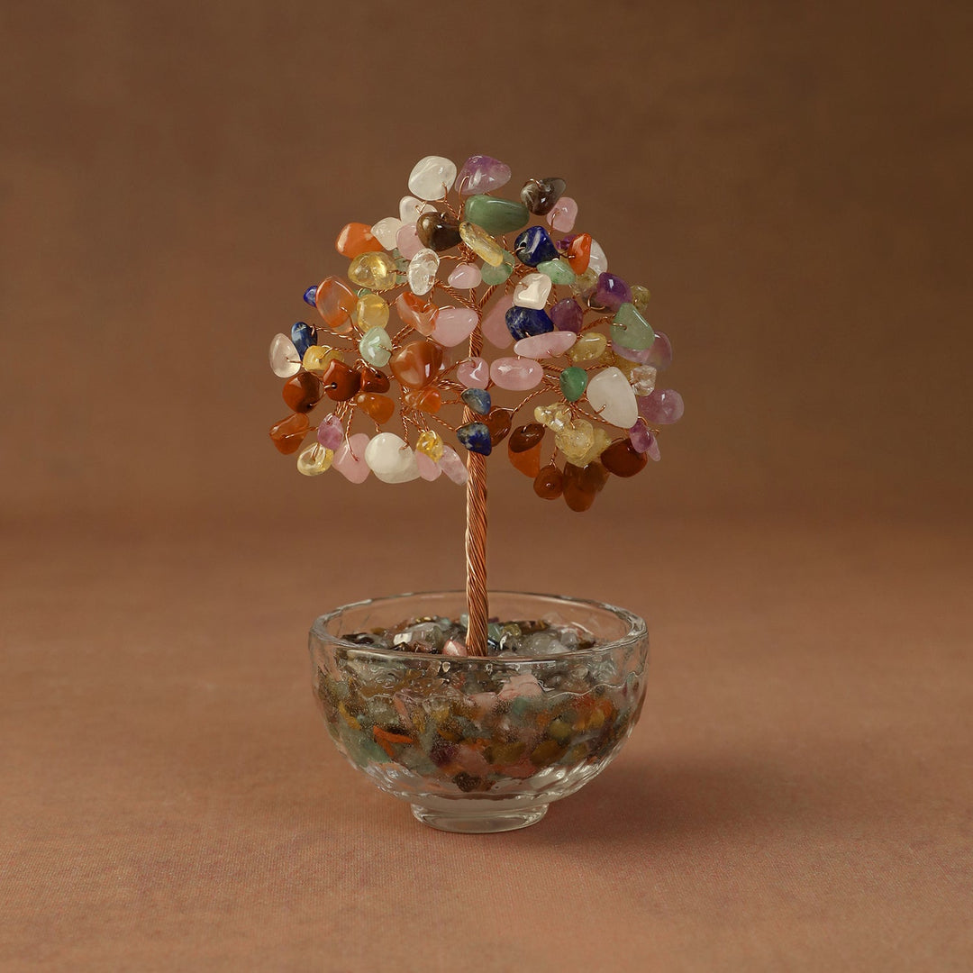 Multicolor crystal tree ornament with beaded branches in a clear glass bowl