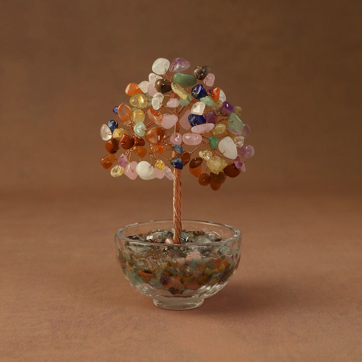 Multicolor crystal tree ornament with beaded branches in a clear glass bowl