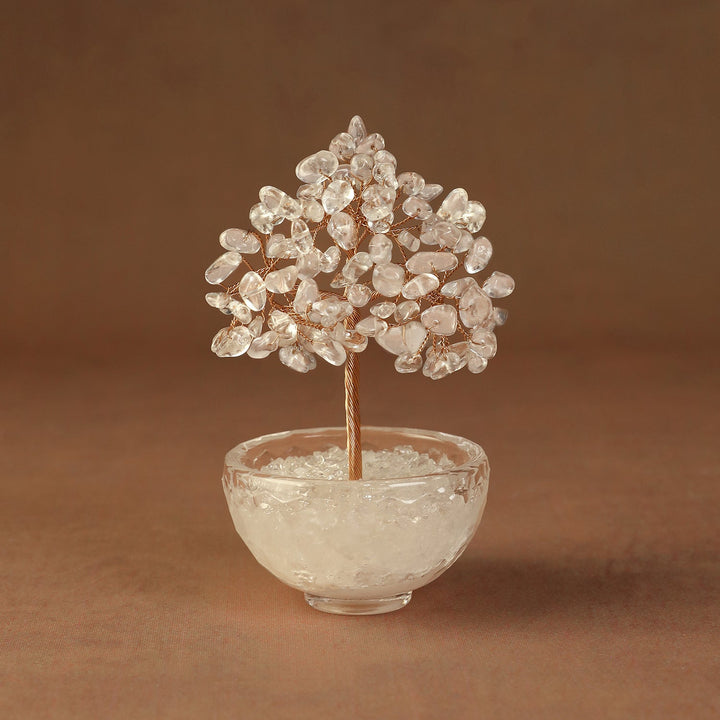 Clear crystal tree ornament with beaded branches in a clear glass bowl