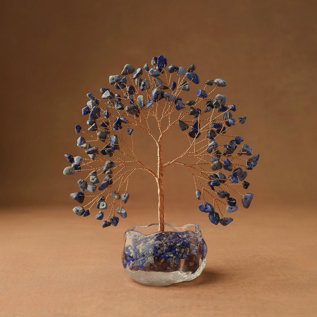 Crystal tree decor with dark blue gem leaves and wire trunk in clear glass base