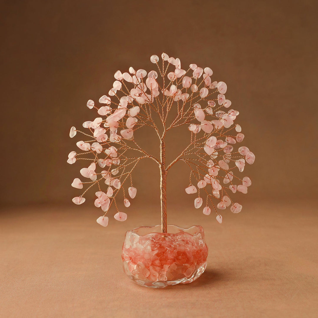 Pink rose quartz gemstone crystal tree with crystal bowl base