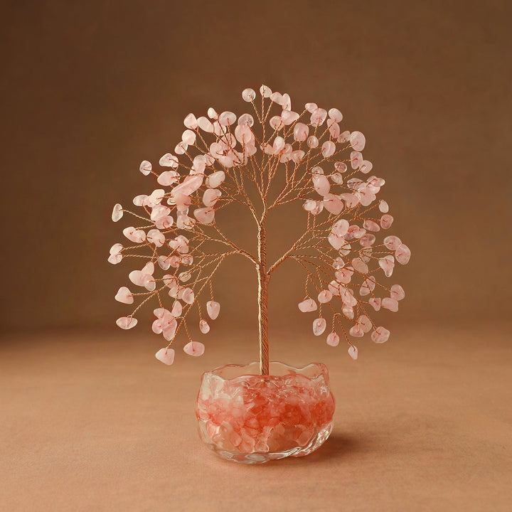Pink rose quartz gemstone crystal tree with crystal bowl base